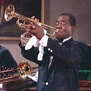 man plays trumpet