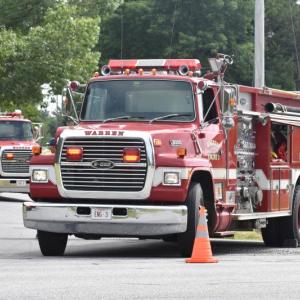 fire trucks in foreground, background
