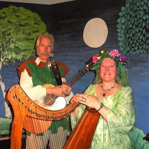 man, woman in costume