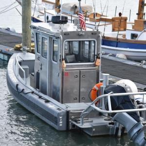 boat tied to dock