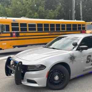 school bus and sheriff's office cruiser