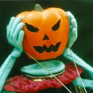 puppet with jack-o-lantern head