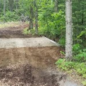 dirt road over a stream