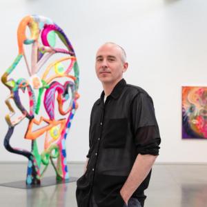 man in art gallery