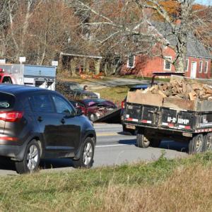 car being pulled out of ditch