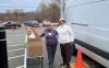 Volunteers help lighten the load. Photo courtesy Alan Kearl
